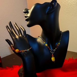 Beaded necklace and bracelet with sterling silver clasps